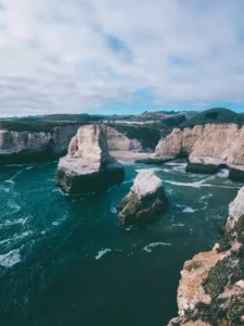 Sea stacks rising from green water