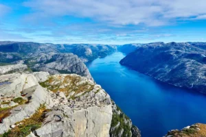 A deep fjord between grey cliffs