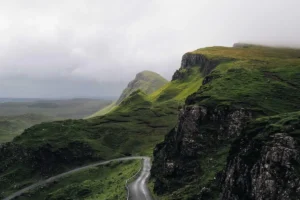 An empty road towards the mountains